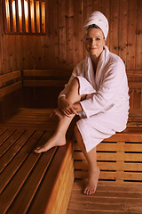 Image showing Woman, portrait and spa sauna or holiday relax at hotel accommodation or calm, treatment or stress relief. Female person, face and towel at Bali resort or healthy vacation for wellness, care or rest