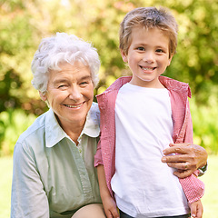 Image showing Grandmother, grandchild and hug with park, love and smile with portrait for senior and happiness. Woman, child and nature with embrace, bonding and family with care and childhood for retirement