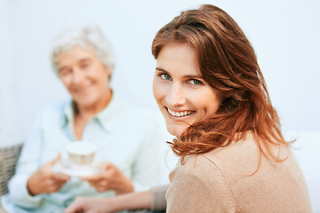Image showing Portrait, mother and daughter with coffee in happiness for bonding, outdoor and support with care. Family, women and together at home with smile on break for visit, joy and love to create memories