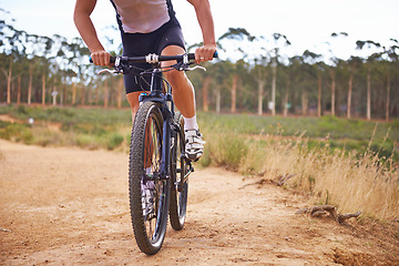 Image showing Person, bike and countryside for nature, off road and cycling for health and wellness. Athlete, bicycle and training for workout, transportation and exercise with cape town mountain trail for fitness