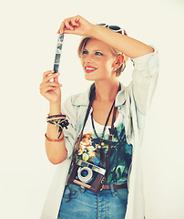 Image showing Woman, camera and film for fashion, retro and photography in casual outfit for creative hobby. Smile, female person or analog lens for trendy, vintage or clothing for artistic, style and aesthetic