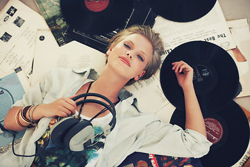 Image showing Floor, music and portrait of woman with headphones for streaming subscription, audio and radio. Podcast, smile and above of person listening to playlist, song and track in home with vinyl records
