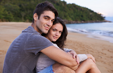 Image showing Portrait, hug and happy couple on beach for outdoor travel adventure, summer island holiday and relax. Ocean vacation, woman and man embrace in nature on romantic date together with smile in Bali.