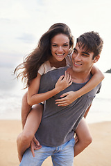 Image showing Couple, sea and piggyback with fun, smile and nature with travel and date for relationship. Man, woman and indonesia beach for adventure, vacation and tropical holiday with sunshine and portrait