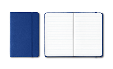 Image showing Marine blue closed and open lined notebooks isolated on white