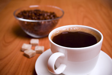 Image showing cup of coffee, sugar and beans