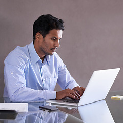 Image showing Businessman, laptop and email by desk for project management and online research in office. Entrepreneur, computer or technology for small business website, productivity or growth of startup company