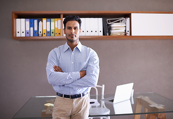Image showing Office, portrait and businessman with arms crossed in confidence and pride in asset management. Corporate, investor and working on portfolio in workplace with laptop for research on stock market