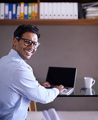 Image showing Office, clerk and portrait of happy man with laptop for administration, files and professional efficiency. Corporate, employee and businessman with a smile for working on portfolio, update and report