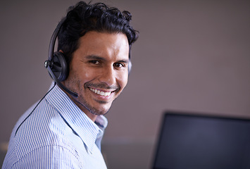 Image showing Man, call center and portrait with CRM and smile for tech support, help desk and communication with headset. Customer service consultant, contact us and telecom with mic for telemarketing sales