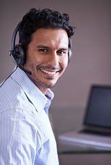 Image showing Man, call center and portrait with contact us and smile for tech support, help desk and communication with headset. Customer service consultant, CRM and telecom with mic for telemarketing sales