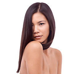 Image showing Woman, portrait and confidence for hairstyle in studio, beauty and pride for keratin treatment. Asian female person, shampoo and cosmetics for healthy hair on white background, dermatology and care