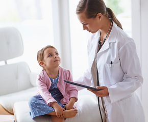 Image showing Pediatrician, child and tablet at pediatric hospital for health examination, wellness and support. Medical professional, kid patient and technology in clinic for healthcare, medicine and consult.