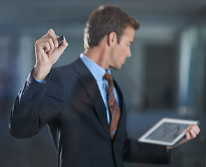 Image showing Businessman, planning and writing on glass with tablet for notes, ideas or strategy for stocks with research. Virtual, data and man problem solving on window or screen with online economy results