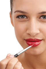 Image showing Happy woman, portrait and red lipstick with makeup for glow, beauty or facial cosmetics on a white studio background. Face or closeup of female person or model applying color or gloss for cosmetology