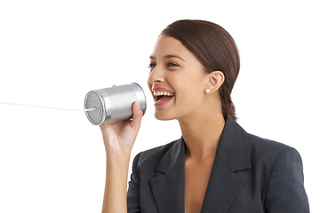 Image showing Tin can telephone, business and woman talking, employee and worker isolated on a white studio background. Person, model and entrepreneur with fun, smile and loud with toys, playing and professional