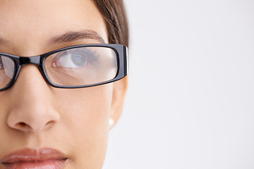 Image showing Young woman, thinking and glasses for inspiration and eyecare or optometry in studio mock up. Model, vision and creative idea for career growth, design and planning in spectacles by white background