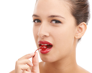 Image showing Happy woman, portrait and red lipstick with cherry, makeup or cosmetics for nutrition on a white studio background. Face of female person or model with lip gloss and natural organic fruit for diet