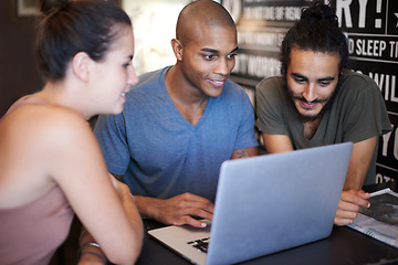 Image showing Laptop, design and teamwork with business people in coffee shop together for planning or agenda. Computer, collaboration and diversity with happy young employee group working on project in cafe