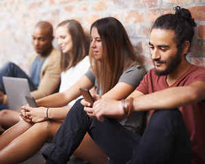 Image showing Smartphone, typing and students in a hallway, university and connection with social media and lunch break. Group, outdoor and friends in lobby and cellphone and mobile user with education and contact