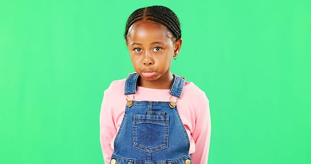 Image showing Sad, expression and face of a child on a green screen isolated on a studio background. Depression, unhappy and portrait of an African girl kid looking moody, disappointed and expressing sadness