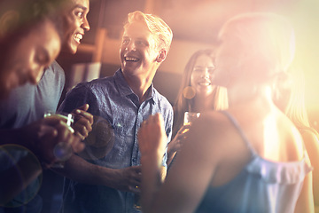 Image showing Nightclub, friends and people with alcohol, cocktail and drinks for fun, social gathering and festive. Happy, relax and men and women with beer in bar together for weekend, celebration and holiday