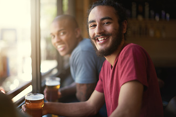 Image showing Male people, beer and chill at pub, smile and relax indoor for fun and bonding in summer to destress. Friends, bar and funny for social, guys and alcohol together and laughing for fun and weekend.