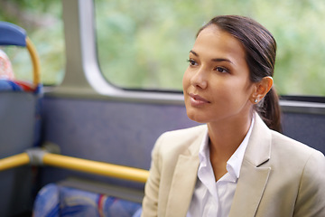 Image showing Woman, smile and commute on public transportation or bus, journey and travel to work in city. Female person, businessperson and trip or transit on metro, traffic and passenger or relax in vehicle