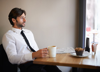 Image showing Businessman, window and thinking at coffee shop with newspaper for information, opportunity and idea for company. Entrepreneur, break and vision with imagination and plan for startup business.