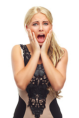 Image showing Portrait, surprise and fear with woman, shocked and afraid isolated on white studio background. Face, person or model with emoji or reaction with anxiety and scared with panic attack or emotional