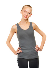 Image showing Portrait, health and fitness with sports woman in studio isolated on white background for workout. Exercise, training and wellness with young person as personal trainer in tank top for coaching