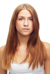Image showing Portrait, beauty and hair with redhead woman in studio isolated on white background for keratin treatment. Face, salon or skincare and natural young person with shampoo or conditioner for haircare