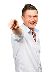 Image showing Happy man, portrait and pointing to you for decision, choice or pick on a white studio background. Isolated, handsome male person or young model with smile for choose or selection in stylish clothing
