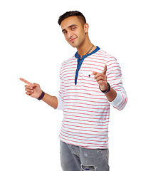 Image showing Hands, pointing and portrait of man in studio with deal comparison, info or direction choice on white background. Face, smile and Indian male model show quote promo, decision or news announcement