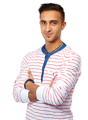 Image showing Portrait, fashion and man with arms crossed in studio with pride isolated on a white background. Face, confidence or young person, model or student in casual clothes for style on a backdrop in Brazil