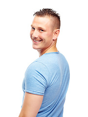 Image showing Man, portrait and confidence for fashion, clothing and trendy style in casual looks on studio background with happiness, contemporary outfit and smile. Male person, model and face in blue t shirt