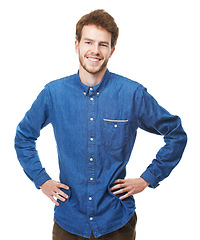 Image showing Man, portrait and confidence for fashion, trendy style and clothing in casual outfit on studio background in edgy apparel, happiness and smile. Male person, model and face in denim shirt with pride