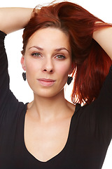 Image showing Face, hair and woman with beauty, cosmetics and keratin treatment for redhead with portrait in studio. Cosmetology, haircare and model from Russia with texture, growth and shine on white background