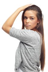 Image showing Portrait, female student and fashion in studio, confidence and style on white background. Spanish girl, model and gen z or learner, fashionable and trendy clothing and aesthetic or contemporary