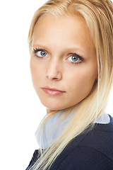 Image showing Studio, portrait and serious young woman with beauty for cosmetics, mascara and foundation by white background. German model, blue eyes and blonde hair for face with makeup and closeup of skincare