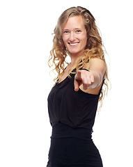 Image showing Portrait, smile and woman with hand pointing at you in studio for news, deal or info on white background. Face, happy or female model show prize, vote or competition giveaway, promotion or invitation