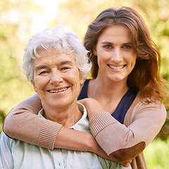 Image showing Mother, daughter and hug with park, love and smile with portrait together for happiness. Senior parent, woman and nature with embrace, bonding and family with care and retirement in backyard