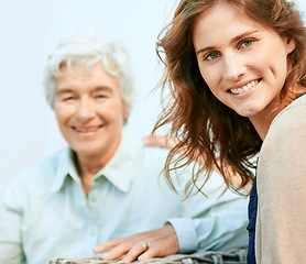 Image showing Senior mom, daughter and home with smile for bonding outdoor and support with care. Portrait, family and women together with happiness on break for visit, joy and love with memories in retirement