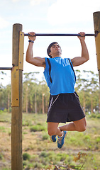 Image showing Athlete, man and exercise with pull up for training, health and wellness at park. Bodybuilder, workout and cardio in nature for fitness, strong muscle and person for sports or competition or hobby