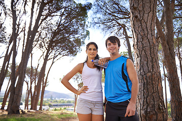 Image showing Fitness, couple and healthy water in forest, smile on nature hike and athlete wellness. Summer, exercise and sports for marathon runner, conservation and environment in park for workout portrait