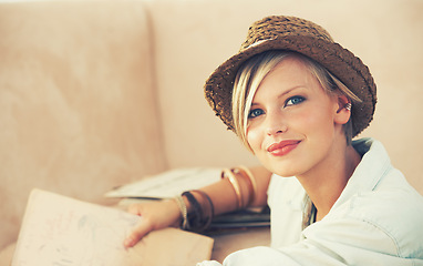 Image showing Portrait, woman and relax on sofa for travel planning for rest and leisure in home in Australia. Happy female person, couch and smile to contemplate tourism idea of break, weekend and getaway