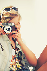 Image showing Woman, camera and lens for retro, travel and photography for weekend getaway in Costa Rica. Creative, photographer or female tourist for analog, shutter or film for art or pictures on summer vacation