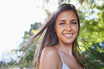 Image showing Woman, farm and portrait in sunshine, nature park and smile on holiday in summer break outdoor. Female person, countryside and happy by tree, vacation and ranch at amazon forest for relaxation