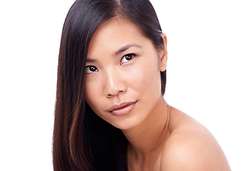 Image showing Asian woman, thinking and white background with hair or skin for beauty, model and cosmetics for skincare or routine. Wellness, closeup and natural or healthy face with dermatology isolated in studio