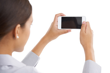 Image showing Mockup, woman and smartphone on studio, background and blank screen for businesswomen capturing image. Technology, networking and communication in social media, isolated and internet connection